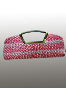 Graceful Pink clutch purse is made with rexin woven work. Metal handle looking nice and pretty. It is handy to carry and impress to all in everywhere. This purse used in parties. Slight Color variations are possible due to differing screen and photograph resolutions.