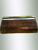 Create a centre of attraction with this beautiful clutch. This bag is nicely designed with shimmer fabric with metal chain. It is handy to carry and impress to all in everywhere. This purse used in casual and parties. Slight Color variations are possible due to differing screen and photograph resolutions.