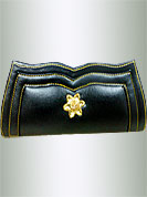 Rexin made black clutch purse is fabulous. Metal brooch on centre of purse is nice. It is handy to carry and impress to all in everywhere. This purse used in parties. Slight Color variations are possible due to differing sc