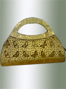 Be stylish with this golden butterfiy printed purse. This is nicely designed with handle and unique shape. It is handy to carry and impress to all in everywhere. This purse used in parties. Slight Color variations are possible due to differing screen and photograph resolutions.