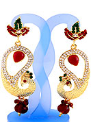 Each design has been carefully crafted keeping in mind the taste of today’s Indian woman. A classic earring is beautified with diamond and crystal moti work. Peacock shape frames studded with white, green and red diamonds. Hanging moti and stone in centre is the main point of attraction. Keep away from water, sweat and perfume. Slight Color variations are possible due to differing screen and photograph resolution.