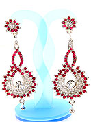 Match your outfits with this earring designed in a floral shape, so that your glamour goes beyond any comparison on your special day. A Pair of earring s nicely crafted with Pink and white diamonds. The base frame of earring is made with alloy metal. Keep away from water, sweat and perfume. Slight Color variations are possible due to differing screen and photograph resolution.