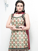 Take the fashion industry by storm in this lovely cream and maroon salwar suit. This amazing suit adorns with floral print work on all over with embroidery velvet patch work on neckline, bottom area and shoulders done with resham, zari, beads, cutdana and stone work. Stylish neck pattern is stunning. This suit is made with silk fabric. Matching salwar and embellished dupatta is available with this. Slight Color variations are possible due to differing screen and photograph resolutions.