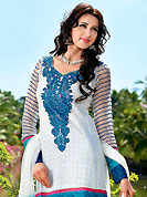 The evolution of style species collection spells pure femininity. This off white and blue kameez is embllished with beautiful stripe print, embroidery and patch work in fabulous style. Embroidery is done resham, self weaving and lace work. Stylish embroidery patch is eye catching to impress all. Contrasting blue faux georgette trouser and faux georgette dupatta is available with this suit. This drape crafted with faux georgette fabric. Slight color variations are possible due to differing screen and photograph resolutions.