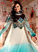 Keep the interest with this designer embroidery suit. The dazzling kameez have amazing embroidery patch work done with resham work. Embroidery on kameez is highlighting the beauty of this suit. Beautiful patch border on kameez is stunning. Matching churidar and dupatta come along with this suit. This drape material is net fabric. The entire ensemble makes an excellent wear. Accessories shown in the image is just for photography purpose. Slight Color variations are possible due to differing screen and photograph resolutions.
