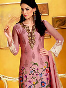 An occasion wear perfect is ready to rock you. The dazzling onion pink chanderi churidar suit have amazing embroidery and patch work. Embroidery is done with resham and sequins work in form of floral motifs. Embroidery on kameez is highlighting the beauty of this suit. Beautiful patch work on kameez is stunning. Matching crepe churidar and chiffon dupatta come along with this suit. Accessories shown in the image is just for photography purpose. Slight Color variations are possible due to differing screen and photograph resolutions.