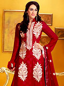 Take a look on the changing fashion of the season. The dazzling maroon georgette churidar suit have amazing embroidery and patch work. Embroidery is done with resham and sequins work in form of floral motifs. Embroidery on kameez is highlighting the beauty of this suit. Beautiful embroidery patch work on kameez is stunning. Matching crepe churidar and chiffon dupatta come along with this suit. Accessories shown in the image is just for photography purpose. Slight Color variations are possible due to differing screen and photograph resolutions.