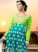 Take a look on the changing fashion of the season. The dazzling lime green and turquoise blue anarkali churidar suit have amazing embroidery and patch work. Embroidery is done with resham, sequins and lace work in form of floral and paisley motifs. Embroidery on kameez is highlighting the beauty of this suit. Matching churidar and off white dupatta come along with this suit. This beautiful party wear suit is made with georgette fabric. The entire ensemble makes an excellent wear. Accessories shown in the image is just for photography purpose. Slight Color variations are possible due to differing screen and photograph resolutions.