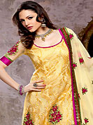 An occasion wear perfect is ready to rock you. The dazzling golden yellow churidar suit have amazing embroidery patch work. Embroidery is done with resham and sequins work in form of floral motifs. All over embroidery work on kameez is stunning. Contrasting dark magenta churidar and matching dupatta is available with this suit. Accessories shown in the image is just for photography purpose. Slight Color variations are possible due to differing screen and photograph resolutions.
