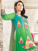 Embroidered suits are the best choice for a girl to enhance her feminine look. The dazzling light green georgette churidar suit have amazing embroidery patch work is done with resham work. The entire ensemble makes an excellent wear. Matching churidar and shaded dupatta is available with this suit. Slight Color variations are possible due to differing screen and photograph resolutions.