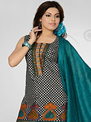 The most beautiful refinements for style and tradition. The dazzling black and off white cotton readymade salwar kameez have amazing floral, geometric print and patch work. The entire ensemble makes an excellent wear. Contrasting turquoise cotton salwar and red and cotton dupatta is available with this suit. Slight Color variations are possible due to differing screen and photograph resolutions.