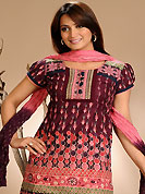 Look stunning rich with dark shades and floral patterns. The dazzling white and black cotton readymade salwar kameez have amazing floral, abstract print and patch work. The entire ensemble makes an excellent wear. Matching pink cotton salwar and shaded dupatta is available with this suit. Slight Color variations are possible due to differing screen and photograph resolutions.