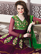 This season dazzle and shine in pure colors. The dazzling burgundy faux georgette anarkali churidar suit have amazing embroidery patch work is done with resham, zari, sequins, stone and lace work. Beautiful embroidery work on kameez is stunning. The entire ensemble makes an excellent wear. Matching santoon churidar and green net dupatta is available with this suit. Slight Color variations are possible due to differing screen and photograph resolutions.