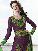The traditional patterns used on this suit maintain the ethnic look. The dazzling violet art silk salwar kameez have amazing embroidery patch work is done with resham, zari and sequins work. Beautiful embroidery work on kameez is stunning. The entire ensemble makes an excellent wear. Matching santoon salwar and green dupatta is available with this suit. Slight Color variations are possible due to differing screen and photograph resolutions.