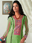 Get ready to sizzle all around you by sparkling suit. The dazzling pastel green cotton jacquard salwar kameez have amazing embroidery patch work is done with resham work. Beautiful embroidery work on kameez is stunning. Matching printed salwar and turquoise printed chiffon dupatta is available with this suit. Slight Color variations are possible due to differing screen and photograph resolutions.