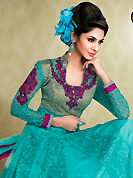 Breathtaking collection of suits with stylish embroidery work and fabulous style. The dazzling sky blue net churidar suit have amazing embroidery patch work is done with resham, sequins, stone and lace work. Beautiful embroidery work on kameez is stunning. The entire ensemble makes an excellent wear. Matching churidar and dupatta is available with this suit. Slight Color variations are possible due to differing screen and photograph resolutions.
