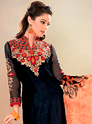 Be ready to slip in the comfort zone of this embroidered suit. This black cotton jacquard churidar suit have amazing embroidery patch work is done with resham work. Embroidery on kameez is highlighting the beauty of this suit. Contrasting beige churidar and shaded chiffon dupatta come along with this suit. Slight Color variations are possible due to differing screen and photograph resolutions.
