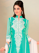 Dreamy variation on shape and forms compliment your style with tradition. This light green cotton churidar suit have amazing embroidery patch work is done with resham and lace work. Embroidery on kameez is highlighting the beauty of this suit. Contrasting white churidar and white chiffon dupatta come along with this suit. Slight Color variations are possible due to differing screen and photograph resolutions.
