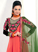Outfit is a novel ways of getting yourself noticed. The dazzling light red georgette churidar suit have amazing embroidery patch work is done with resham, zari and stone work. Beautiful embroidery work on kameez is stunning. The entire ensemble makes an excellent wear. Matching santoon churidar and green chiffon dupatta is available with this suit. Slight Color variations are possible due to differing screen and photograph resolutions.