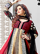 An occasion wear perfect is ready to rock you. The dazzling sand brown, black and red cotton and satin anarkali churidar suit have amazing embroidery patch work is done with resham, zari, sequins and lace work. Beautiful embroidery work on kameez is stunning. The entire ensemble makes an excellent wear. Matching black santoon churidar and dupatta is available with this suit. Slight Color variations are possible due to differing screen and photograph resolutions.