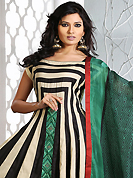 The most beautiful refinements for style and tradition. The dazzling beige and black cotton silk readymade anarkali churidar suit have amazing embroidery patch work is done with resham work. Beautiful embroidery work on kameez is stunning. The entire ensemble makes an excellent wear. Matching black churidar and green dupatta is available with this suit. Slight Color variations are possible due to differing screen and photograph resolutions.