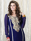Your search for elegant look ends here with this lovely suit. The dazzling dark blue faux georgette churidar suit have amazing embroidery patch work is done with resham and stone work. Beautiful embroidery work on kameez is stunning. The entire ensemble makes an excellent wear. Matching santoon churidar and double dye chiffon dupatta is available with this suit. Slight Color variations are possible due to differing screen and photograph resolutions.