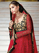 Outfit is a novel ways of getting yourself noticed. The dazzling maroon and black net anarkali churidar suit have amazing embroidery patch work is done with resham, zari, stone and beads work. Beautiful embroidery work on kameez is stunning. The entire ensemble makes an excellent wear. Matching maroon santoon churidar and maroon chiffon dupatta is available with this suit. Slight Color variations are possible due to differing screen and photograph resolutions.