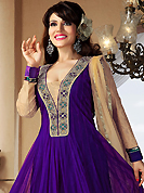 Your search for elegant look ends here with this lovely suit. The dazzling purple net readymade churidar suit have amazing embroidery patch work is done with stone, gold zardosi, cutdana, beads and lace work. The entire ensemble makes an excellent wear. Contrasting beige santoon churidar and beige net dupatta is available with this suit. Slight Color variations are possible due to differing screen and photograph resolutions.