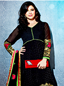 Get ready to sizzle all around you by sparkling suit. The dazzling black brasso long style anarkali churidar suit have amazing embroidery patch work is done with resham work. Beautiful embroidery work on kameez is stunning. The entire ensemble makes an excellent wear. Matching santoon churidar and chiffon dupatta is available with this suit. Slight Color variations are possible due to differing screen and photograph resolutions.