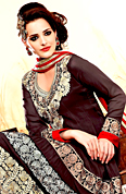 Your search for elegant look ends here with this lovely suit. The dazzling dark grey georgette anarkali churidar suit have amazing embroidery patch work is done with resham, zari and lace work. Beautiful embroidery work on kameez is stunning. The entire ensemble makes an excellent wear. Contrasting red santoon churidar and red chiffon dupatta is available with this suit. Slight Color variations are possible due to differing screen and photograph resolutions.