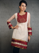 Spread your magic with this crushed cotton white kurti.
The main attraction of this kurti is the outstandind velvet patch in the centre that makes it look elegant.
It has some classy lace work with beautiful combination of red, golden and silver laces that makes it vibrant.
This kurti is suitable for all kinds of occasions and also casual wear.