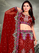 Elegance and innovation of designs crafted for you. This maroon lehenga choli is nicely embroidered and patch work done with  resham, zari, sequins and stone work in form of floral motifs. All over embroidery work on lehenga is stunning. The beautiful embroidery on lehenga made it awesome and gives you stylish and attractive look to others. Matching and dupatta is availble with this lehenga. Slight Color variations are possible due to differing screen and photograph resolutions.