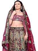 Elegance and innovation of designs crafted for you. This deep burgundy net and dupion silk A-Line lehenga choli is nicely embroidered and patch work done with resham, zari and sequins work in form of floral motifs. All over embroidery work on lehenga is stunning. The beautiful embroidery on lehenga made it awesome and gives you stylish and attractive look to others. Matching choli and dupatta is availble with this lehenga. Slight Color variations are possible due to differing screen and photograph resolutions.