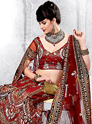 Today’s fashion is really about sensuality which can be seen in this creation. This maroon net lehenga choli is nicely embroidered and patch work done with resham, zari and stone work in form of floral and paisley motifs. All over embroidery work on lehenga is stunning. The beautiful embroidery on lehenga made it awesome and gives you stylish and attractive look to others. Matching choli and dupatta is availble with this lehenga. Slight Color variations are possible due to differing screen and photograph resolutions.