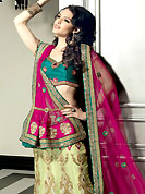 Elegance and innovation of designs crafted for you. This light pastel green net lehenga choli is nicely embroidered patch work done with resham, zari, sequins, stone and beads work in form of floral motifs. The beautiful embroidery on lehenga made it awesome and gives you stylish and attractive look to others. Contrasting teal green choli and dark pink net dupatta is availble with this lehenga. Choli can be customized upto 42 inches. Slight Color variations are possible due to differing screen and photograph resolutions.