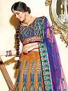 Make your collection more attractive and charming with this impressive dress. This rust and purple net lehenga choli is nicely embroidered and velvet patch border is done with resham, zari, sequins and stone work. The beautiful embroidery on lehenga made it awesome and gives you stylish and attractive look to others. Matching jacquard and net choli and purple net dupatta is availble with this lehenga. Slight Color variations are possible due to differing screen and photograph resolutions.