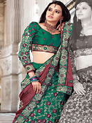 Elegance and innovation of designs crafted for you. This turquoise green satin lehenga choli is nicely embroidered and patch work done with resham and sequins work. The beautiful embroidery on lehenga made it awesome and gives you stylish and attractive look to others. Matching choli and dusty red dupatta is availble with this lehenga. Slight Color variations are possible due to differing screen and photograph resolutions.