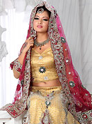 Let your personality speak for you this wedding lehenga embellished with embroidery work. This dark beige net lehenga is nicely embroidered and velvet patch work is done with stone, zardosi, cutdana and cutbeads work. The beautiful embroidery on lehenga made it awesome and gives you stylish and attractive look to others. Matching choli and dark pink net dupatta is availble with this lehenga. Slight Color variations are possible due to differing screen and photograph resolutions.