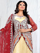 Let your personality speak for you this wedding lehenga embellished with embroidery work. This cream net lehenga is nicely embroidered patch work is done with stone, zardosi, cutdana and cutbeads work. The beautiful embroidery on lehenga made it awesome and gives you stylish and attractive look to others. Matching cream choli, heavy work red net jacket and red net dupatta is availble with this lehenga. Slight Color variations are possible due to differing screen and photograph resolutions.