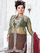 Elegance and innovation of designs crafted for you. This maroon net lehenga is nicely embroidered patch work is done with stone, zardosi, cutdana and cutbeads work. The beautiful embroidery on lehenga made it awesome and gives you stylish and attractive look to others. Contrasting green choli, heavy work green net jacket and maroon net dupatta is availble with this lehenga. Slight Color variations are possible due to differing screen and photograph resolutions.