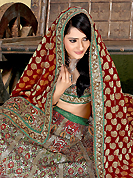 Elegance and innovation of designs crafted for you. This maroon and silver banarasi silk lehenga choli is nicely embroidered and patch work done with resham and sequins work. The beautiful embroidery on lehenga made it awesome and gives you stylish and attractive look to others. Matching choli and maroon dupatta is availble with this lehenga. Slight Color variations are possible due to differing screen and photograph resolutions.
