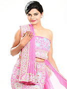 Embroidered lehengas are highly in order on a range of occasions such as wedding, formal party and festivals. This pink crepe silk lehenga is nicely embroidered patch work is done with zardosi, cutdana, stone, beads and cutbeads work. The beautiful embroidery on lehenga made it awesome and gives you stylish and attractive look to others. Matching choli and dupatta is availble with this lehenga. Slight Color variations are possible due to differing screen and photograph resolutions.
