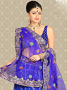 Welcome to the new era of Indian fashion wear. This royal blue net a-line lehenga is nicely embroidered patch work is done with resham, zari, sequins and stone work. The beautiful embroidery on lehenga made it awesome and gives you stylish and attractive look to others. Matching choli and dupatta is availble with this lehenga. Slight Color variations are possible due to differing screen and photograph resolutions.