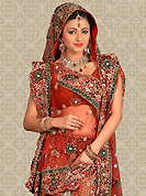 Be the cynosure of all eyes with this wonderful casual wear in flattering colors and combinations. This maroon net a-line lehenga is nicely embroidered and velvet patch work is done with zari, stone and cutbeads work. The beautiful embroidery on lehenga made it awesome and gives you stylish and attractive look to others. Matching choli and dupatta is availble with this lehenga. Slight Color variations are possible due to differing screen and photograph resolutions.