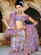 This season dazzle and shine in pure colors. An Amazing and beautiful lehenga choli nicely designed with resham, zari, sequins, worked embroidery and fabric lace patch in floral patterns. This lehenga made with net fabric. Matching blouse and graceful dupatta is available. Slight Color variations are possible due to differing screen and photograph resolutions.