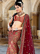 Be the cynosure of all eyes with this exquisite range of embroidery lehenga in flattering colors and combinations. This drape is nicely designed with resham,  zari, sequins and patch work. The beautiful heavy floral embroidery made it awesome and gives you stylish look and unique to others. The matching blouse and chunari are enhanced your personality. Slight Color variations are possible due to differing screen and photograph resolutions.   