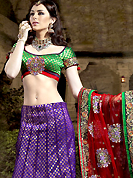 You can be sure that ethnic fashions selections of clothing are taken from the latest trend in today’s fashion. This Violet, Green and red net with banarasi opara silk lining fish cut lehenga choli is beautifully adorned with resham, sequins, zari, stone, lace and patch work done in form of floral motiff. Contrasting banarasi opara silk purple blouse with magenta net dupatta available with this. All over broad embroidered dupion silk patch patti in lehenga and dupatta is enhancing the beauty of this lehenga. Lehenga waist can be customize upto 42 inches, length 40 inches and the bust size is upto 40 inches. As shown lehenga is available. Accessories shown in the image is just for photography purpose. Slight color variations are possible due to differing screen and photograph resolution.