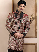 Make your collection more attractive with this dazzling sherwani. This sherwani made with banarasi fabric. This sherwani embellished with zardosi, pearls, beads and stones. Embroiderey work on collar, front and cuff made it stylish and fabulous, gives you a stunning look. Slight Color variations possible due to differing screen and photograph resolutions.