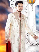 Its cool and have a very modern look to impress all. This cream elegant sherwani designed with all over beads, stone, resham and patch work. The beautiful embroidery on front border, collar, back and cuffs made it awesome and gives you stylish and attractive look to others. Contrasting churidar is enhanced your personality. This sherwani made with brocade fabric. Accessories shown in the image is just for photography purpose. Slight Color variations are possible due to differing screen and photograph resolutions.