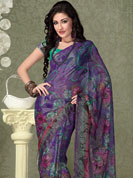 Dreamy variation on shape and forms compliment your style with tradition. This violet georgette smoke saree is simply designed with floral pattern print work on all over saree with border. This beautiful saree is used for casual porpose which gives you a singular and dissimilar look. Color blend of this saree is nice. Matching blouse is available with this saree. Slight color variations possible due to differing screen and photograph resolution.  